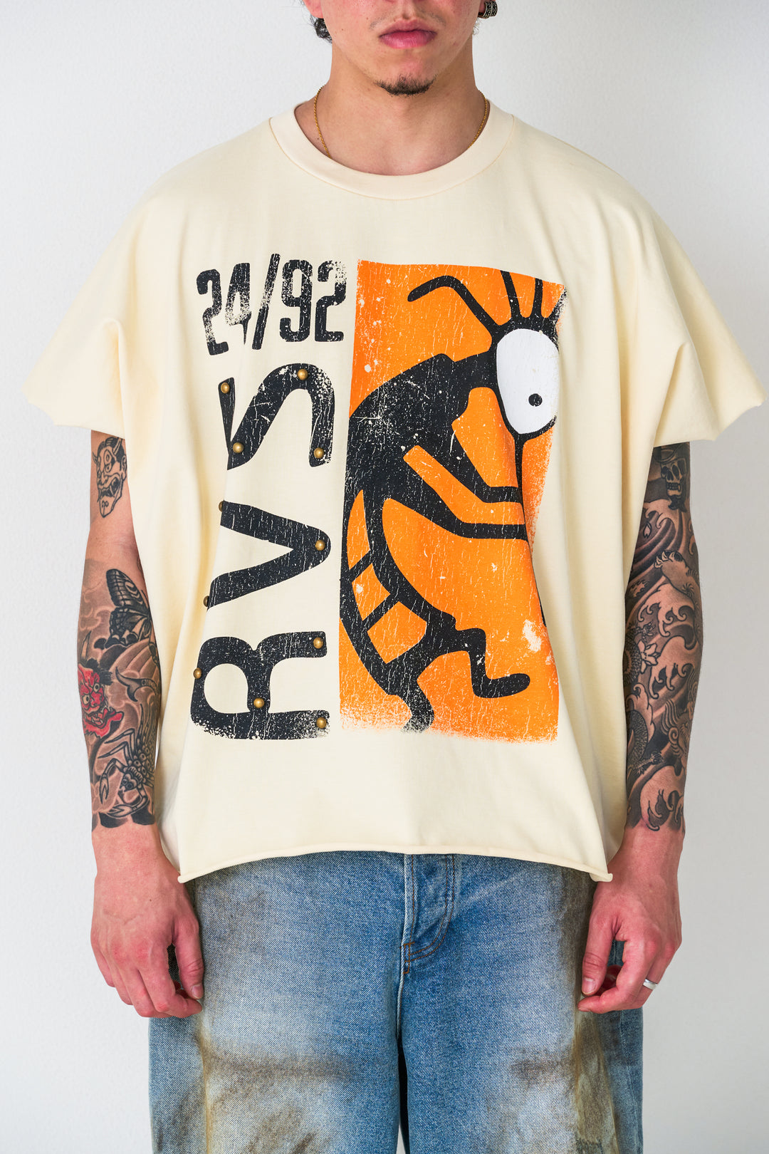 Cream "Artifact"  Cut Off Wing-Tee