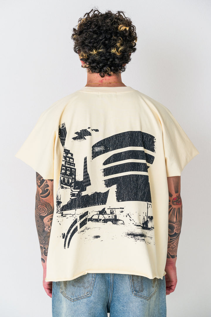 Cream "Artifact"  Cut Off Wing-Tee