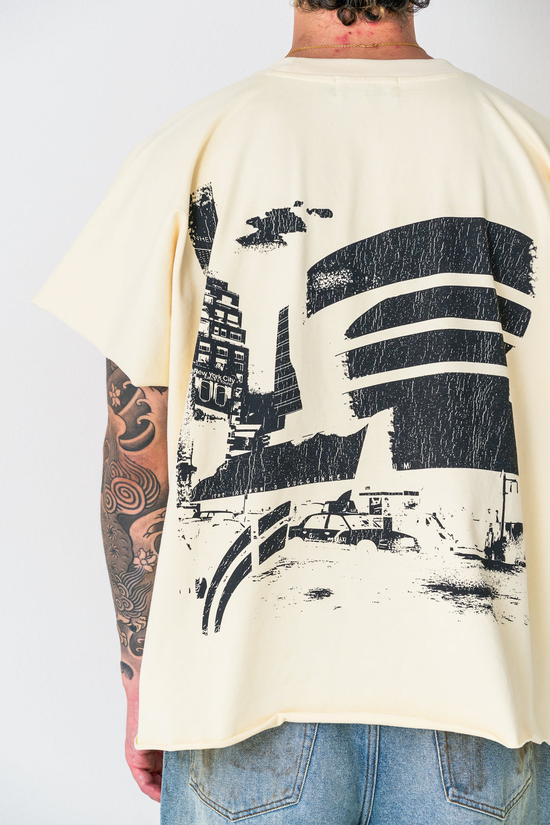 Cream "Artifact"  Cut Off Wing-Tee